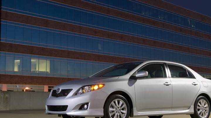2009 Toyota Corolla S In Side Pose Front HeadLights On